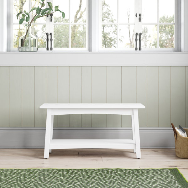 Small white bench for shop entryway